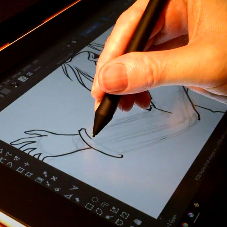 Hand drawing on computer tablet with stylus